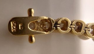 Pulsera b. Oro 18k, plata de ley 925 y 42 zafiros