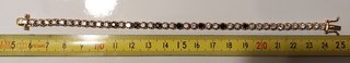 Pulsera b. Oro 18k, plata de ley 925 y 42 zafiros