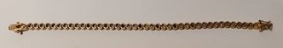 Pulsera b. Oro 18k, plata de ley 925 y 42 zafiros