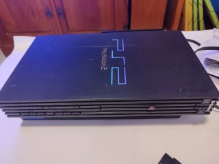PlayStation 2 con cables y mandos nuevos