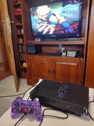 PlayStation 2 con cables y mandos nuevos