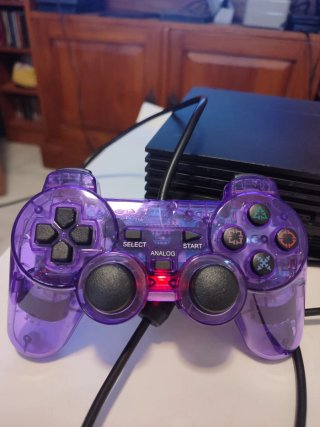 PlayStation 2 con cables y mandos nuevos