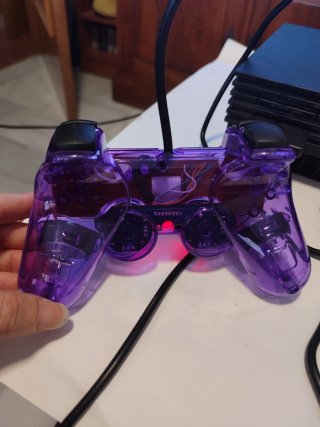 PlayStation 2 con cables y mandos nuevos