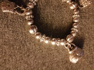 Braccialetto argento con ciondoli borsetta