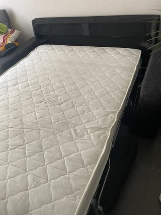 Sofà-llit gris fosc