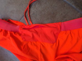 Ropa deportiva naranja pantalón running