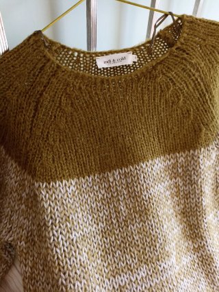 Jersey de punto color verde oliva y beige