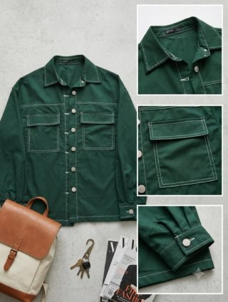 Camisa verde con costuras blancas