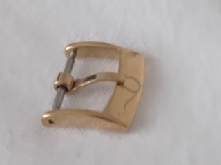 Fibbia Omega Oro