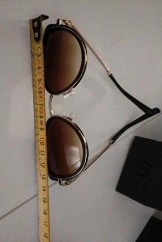 Gafas de sol Hawkers Feline mujer negras y doradas