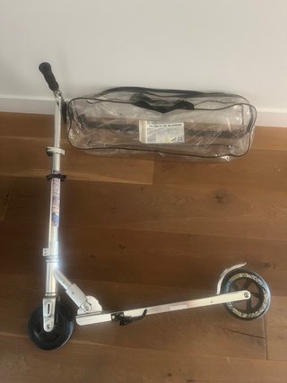 Patinete plegable con bolsa y skate