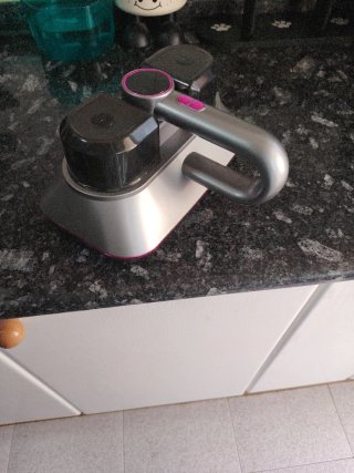 Aspirador de mano con base