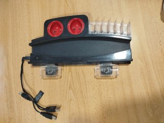 Soporte PS3 con 2 puertos USB y 2 bases de carga