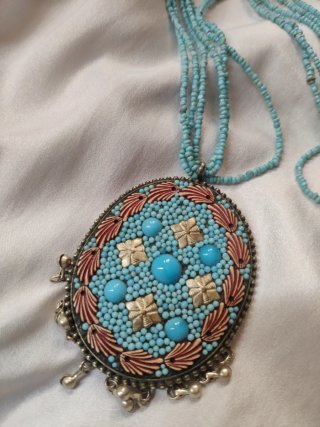 Collana etnica con ciondolo blu e argento