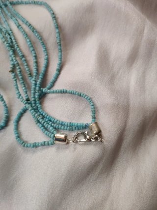 Collana etnica con ciondolo blu e argento