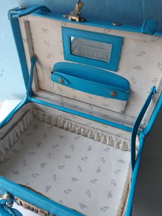 Valigetta Carpisa blu e oro