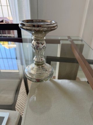 Portavelas Zara Home efecto mercurizado plateado