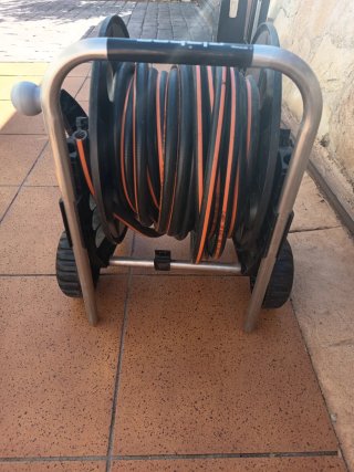 Manguera y carro con Ruedas