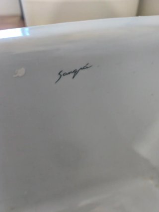 Pila de lavadero de porcelana blanca