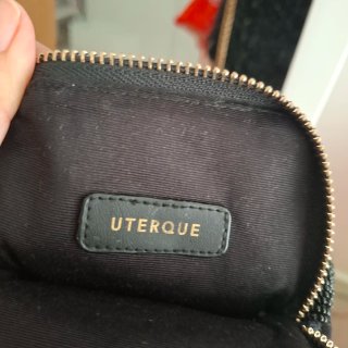 Bolso fiesta UTERQUE negro y dorado