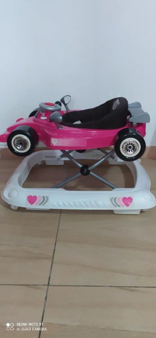 Girello A Salvo Fuxia con Seduta in Tessuto