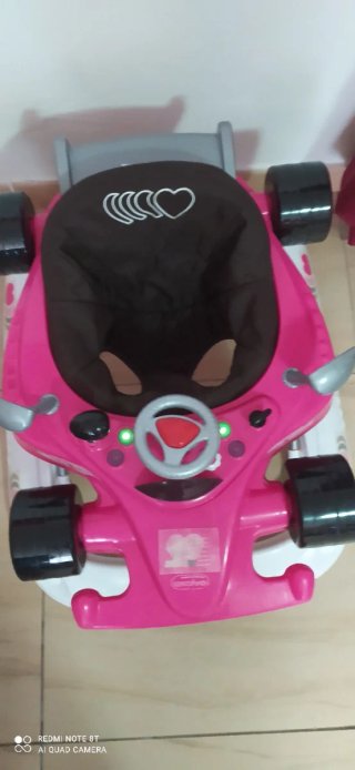 Girello A Salvo Fuxia con Seduta in Tessuto