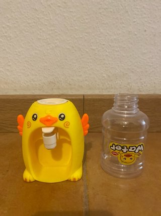 Dispensador agua patito amarillo