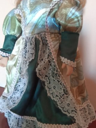 Bambola vintage porcellana occhi blu