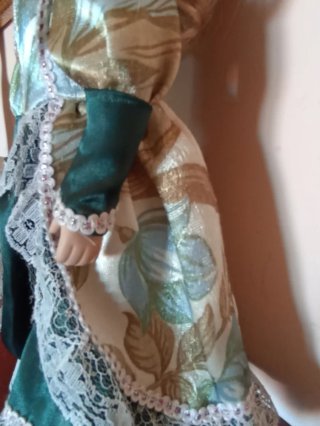 Bambola vintage porcellana occhi blu