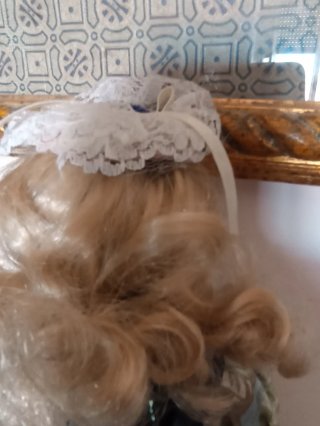 Bambola vintage porcellana occhi blu