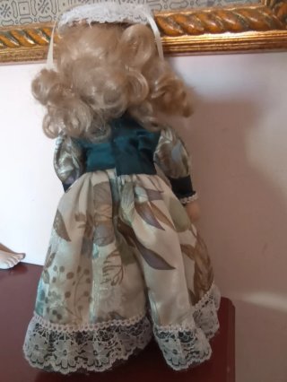 Bambola vintage porcellana occhi blu