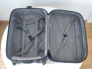 Maleta de viaje azul con ruedas
