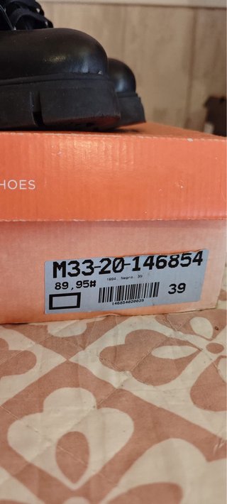 Botín piel negro cordones suela track T39