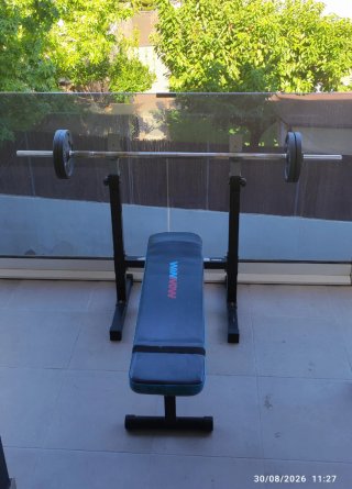 Banco de pesas con barra y discos 20kg