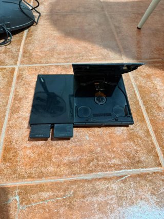 Consola PlayStation 2 con juegos