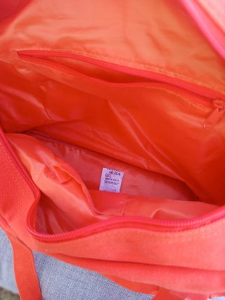 Bolso veraniego de tela naranja grande.