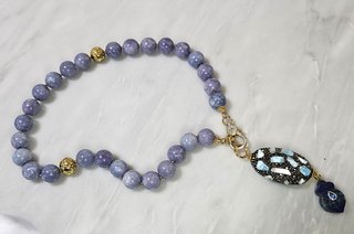 Collana: calcite blu, lapislazzuli, larimar, lava