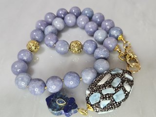 Collana: calcite blu, lapislazzuli, larimar, lava