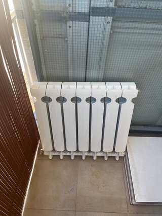Radiador blanco de 7 elementos
