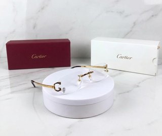Gafas cartier doradas