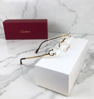 Gafas cartier doradas