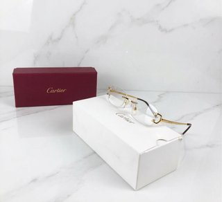Gafas cartier doradas