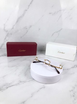 Gafas cartier doradas