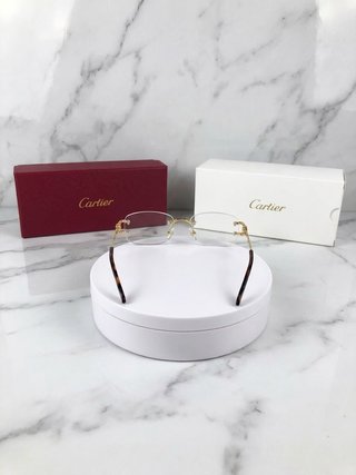 Gafas cartier doradas