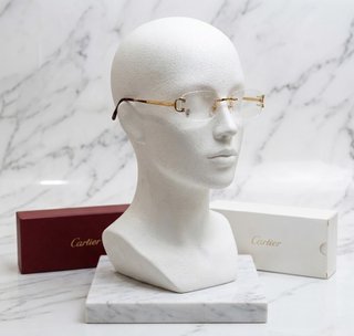 Gafas cartier doradas