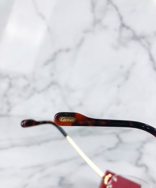 Gafas cartier doradas
