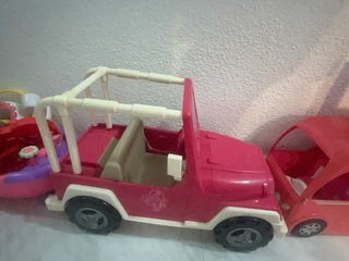 Coche de muñecas grande rosa