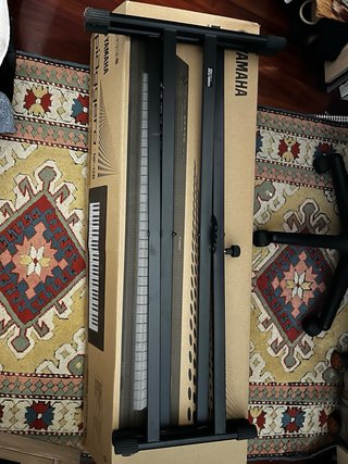 Teclado Yamaha con soporte