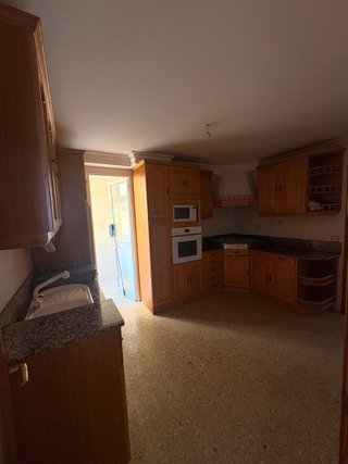 Cocina completa madera y piedra