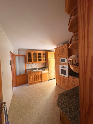 Cocina completa madera y piedra